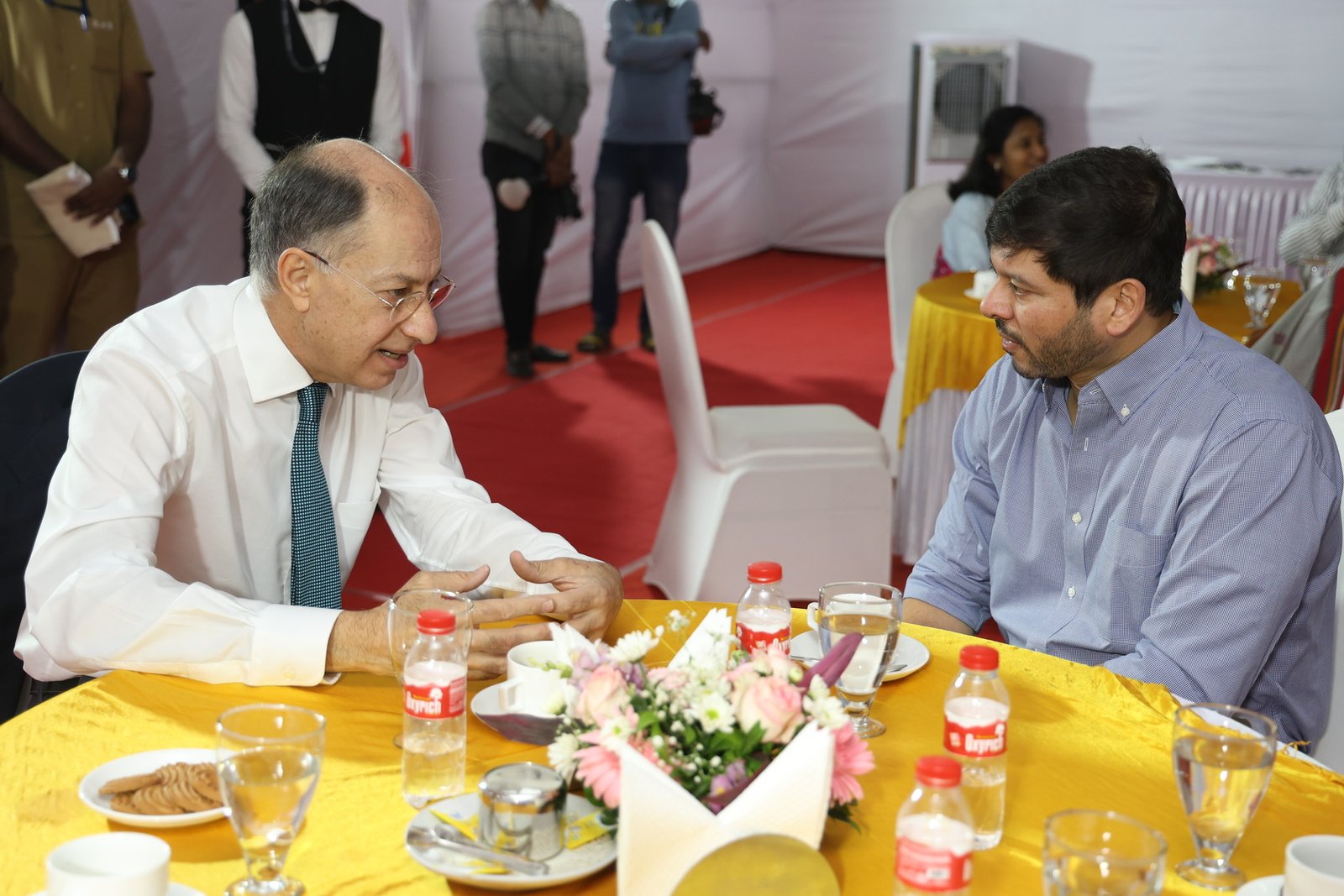 Rohit Tilak with Someone in meeting